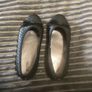 Women’s black flats.
